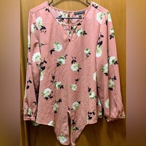 Pink and white floral blouse.